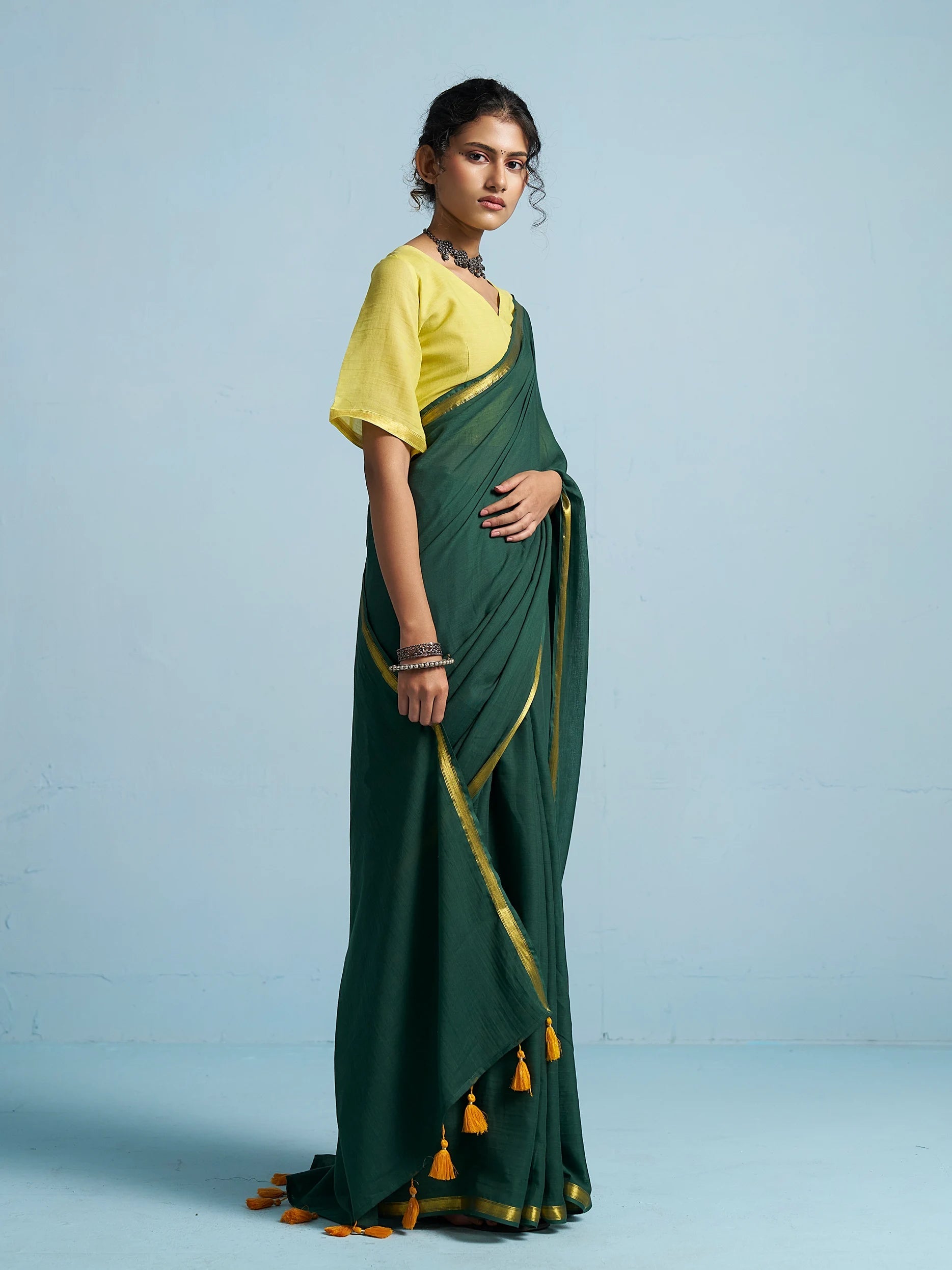 BOTTLE GREEN VISCOSE MUL LIVA SOLID SAREE