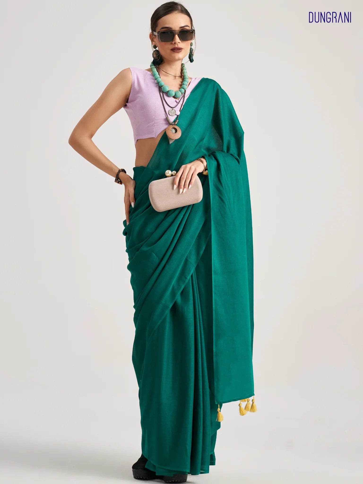 BOTTLE GREEN VISCOSE MUL SOLID SAREE