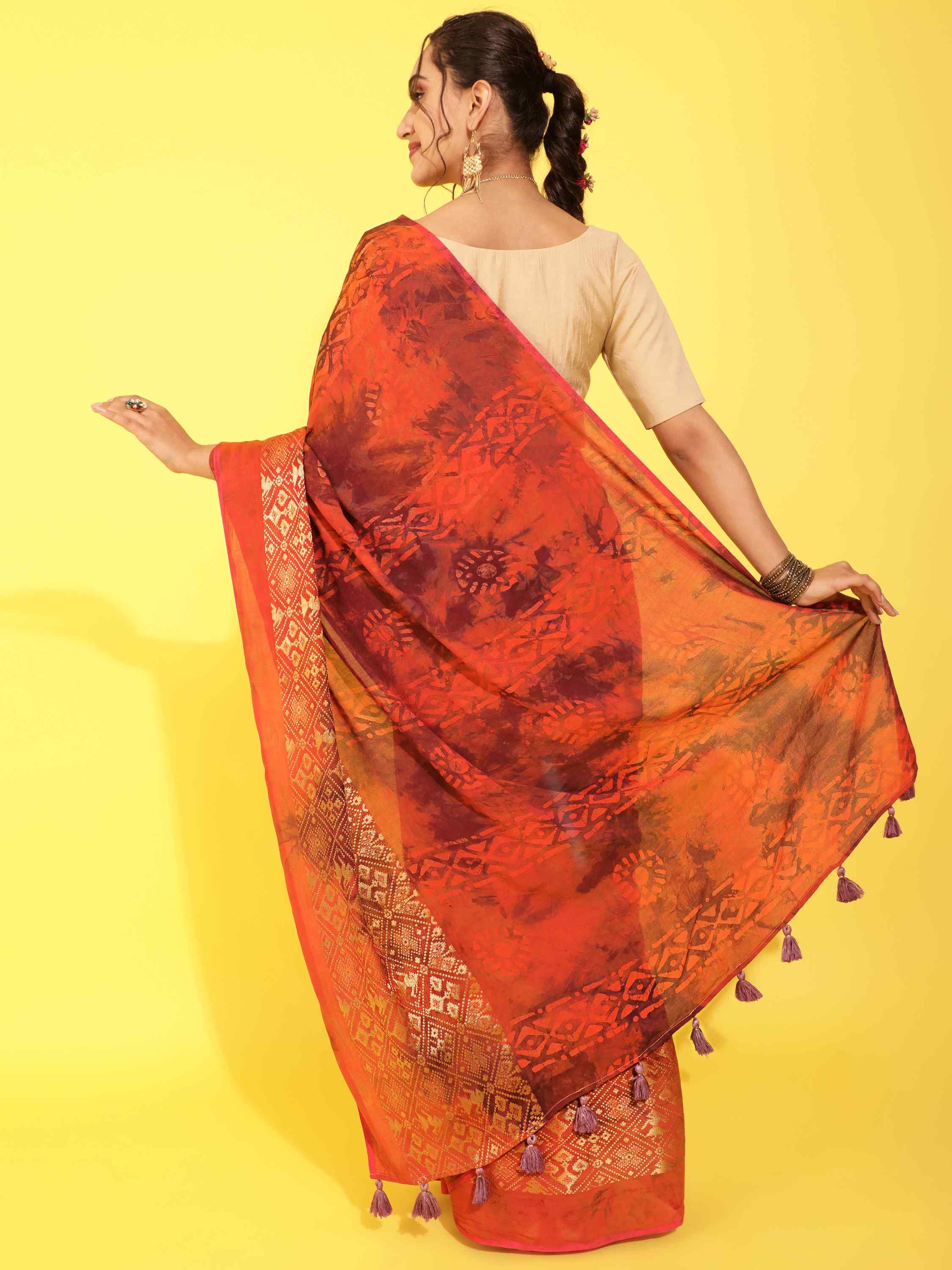 DUNGRANI ORANGE VIVACIOUS PATOLA BATIK LIVA SAREE