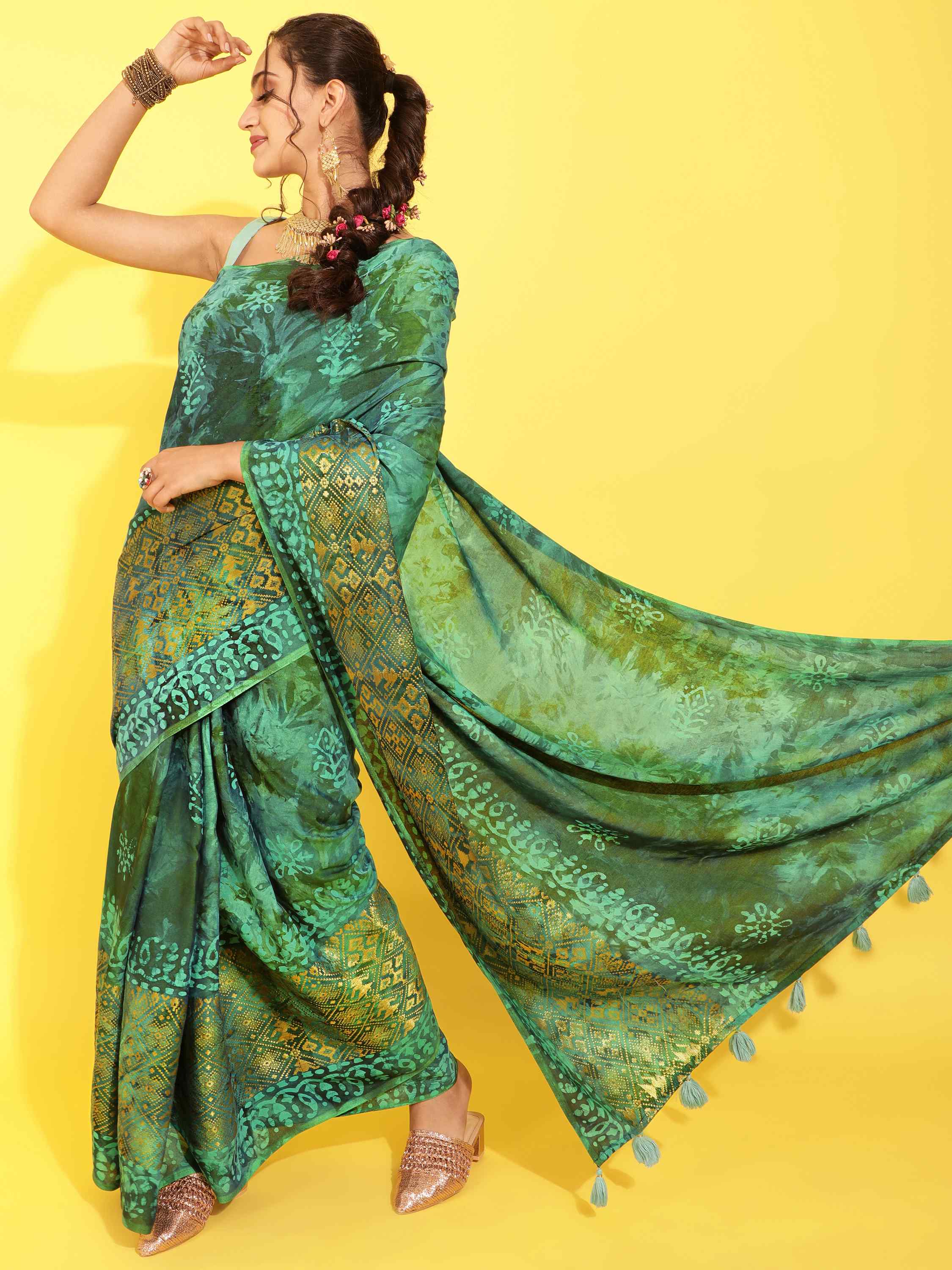 DUNGRANI TURQUOISE VIVACIOUS PATOLA BATIK LIVA SAREE