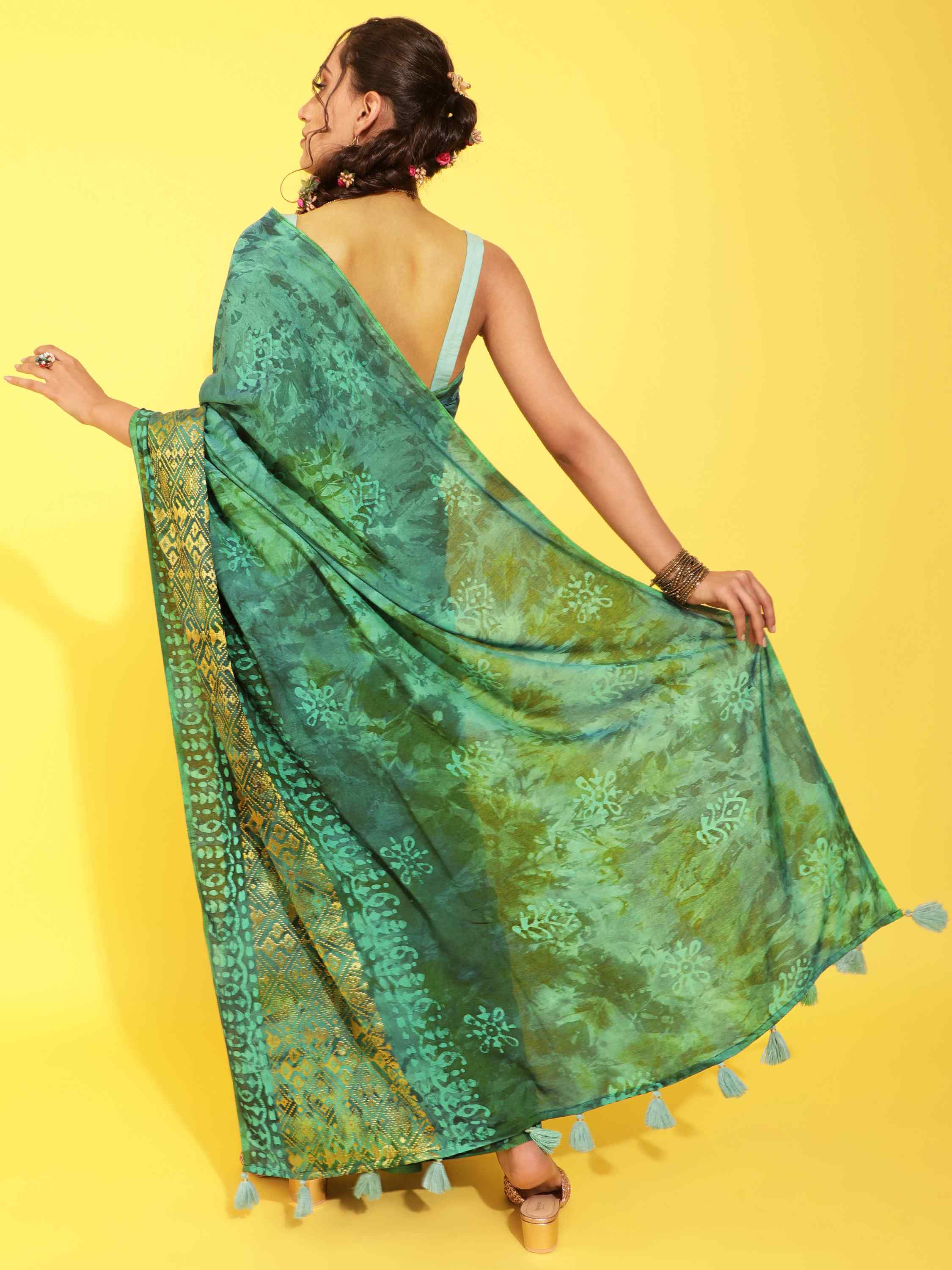 DUNGRANI TURQUOISE VIVACIOUS PATOLA BATIK LIVA SAREE