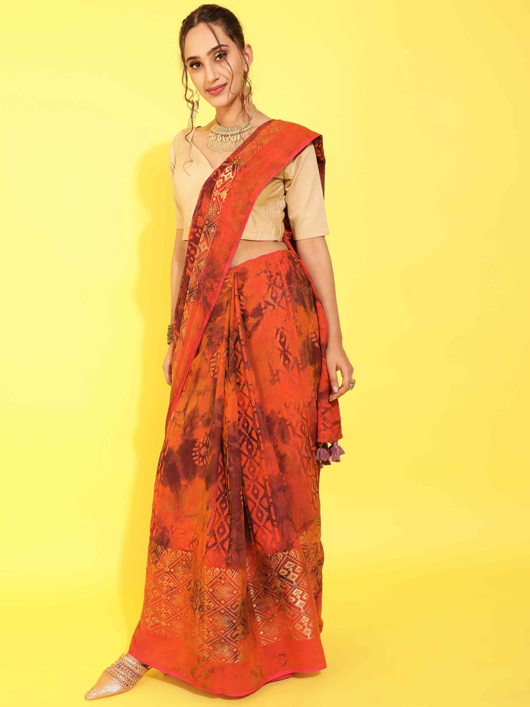 DUNGRANI ORANGE VIVACIOUS PATOLA BATIK LIVA SAREE