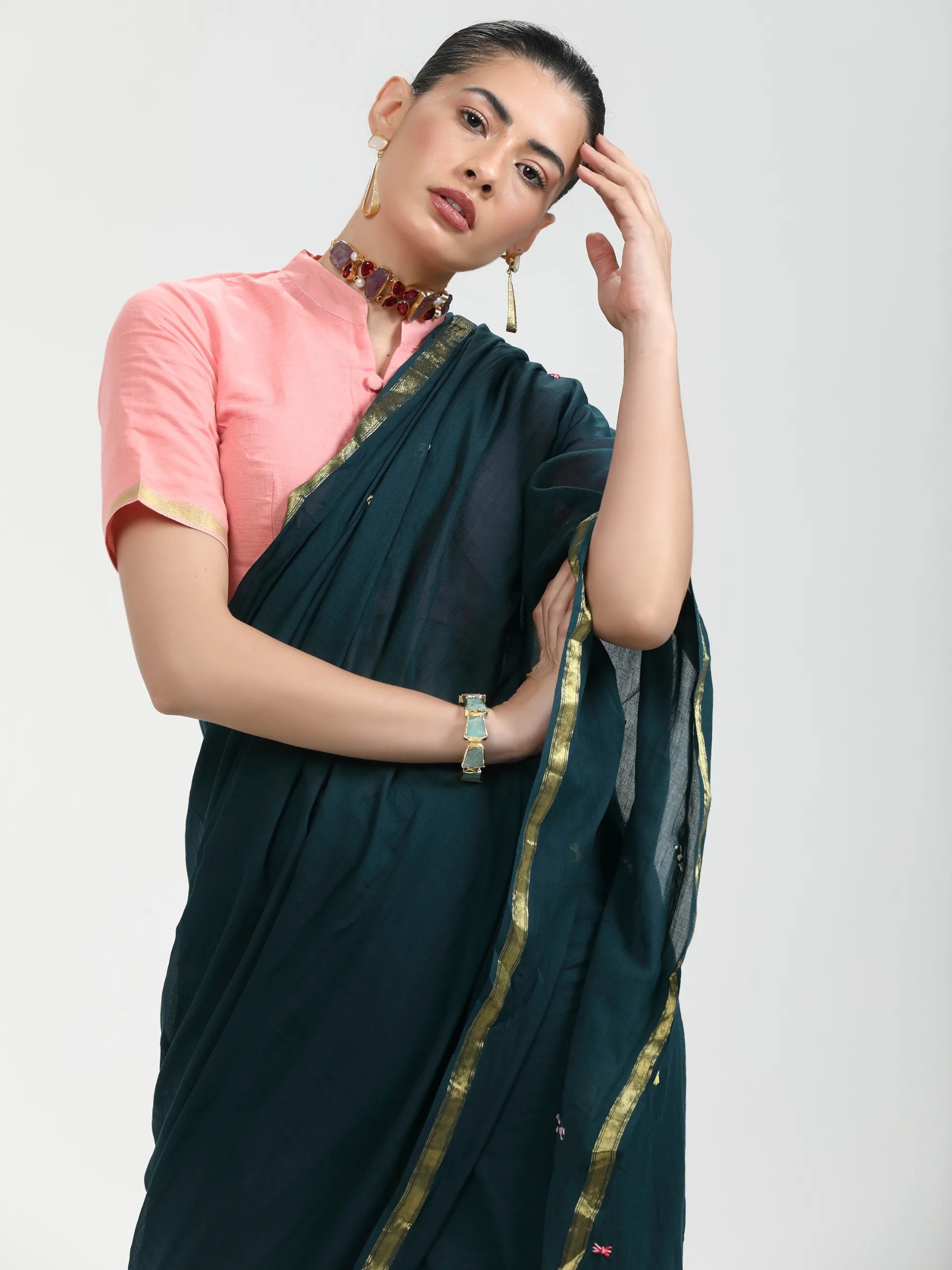 DARK GREEN MULMUL COTTON LIVA THREAD WORK SAREES