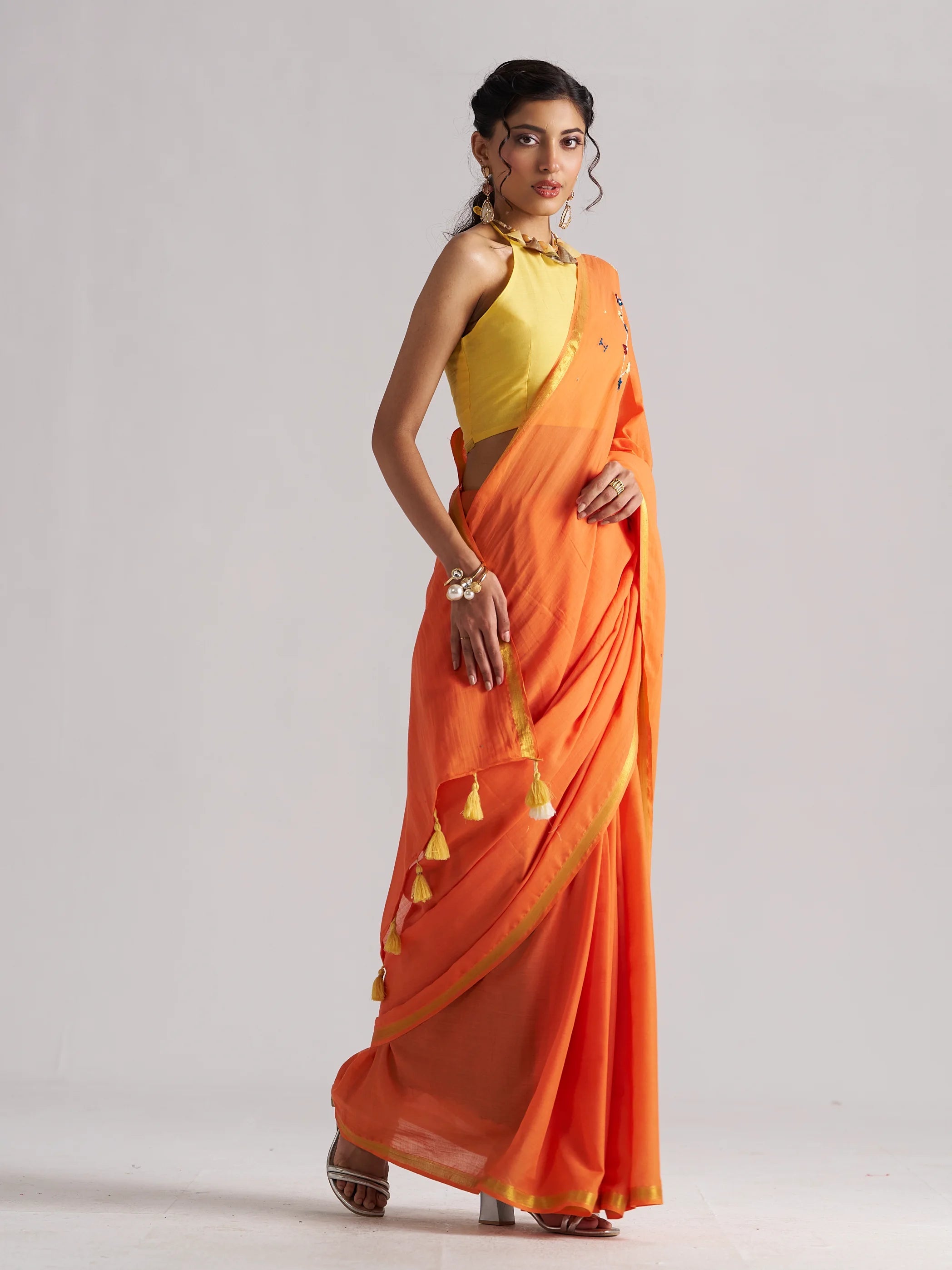 ORANGE VISCOSE MUL LEO CELESTIAL THREAD WORK SAREES