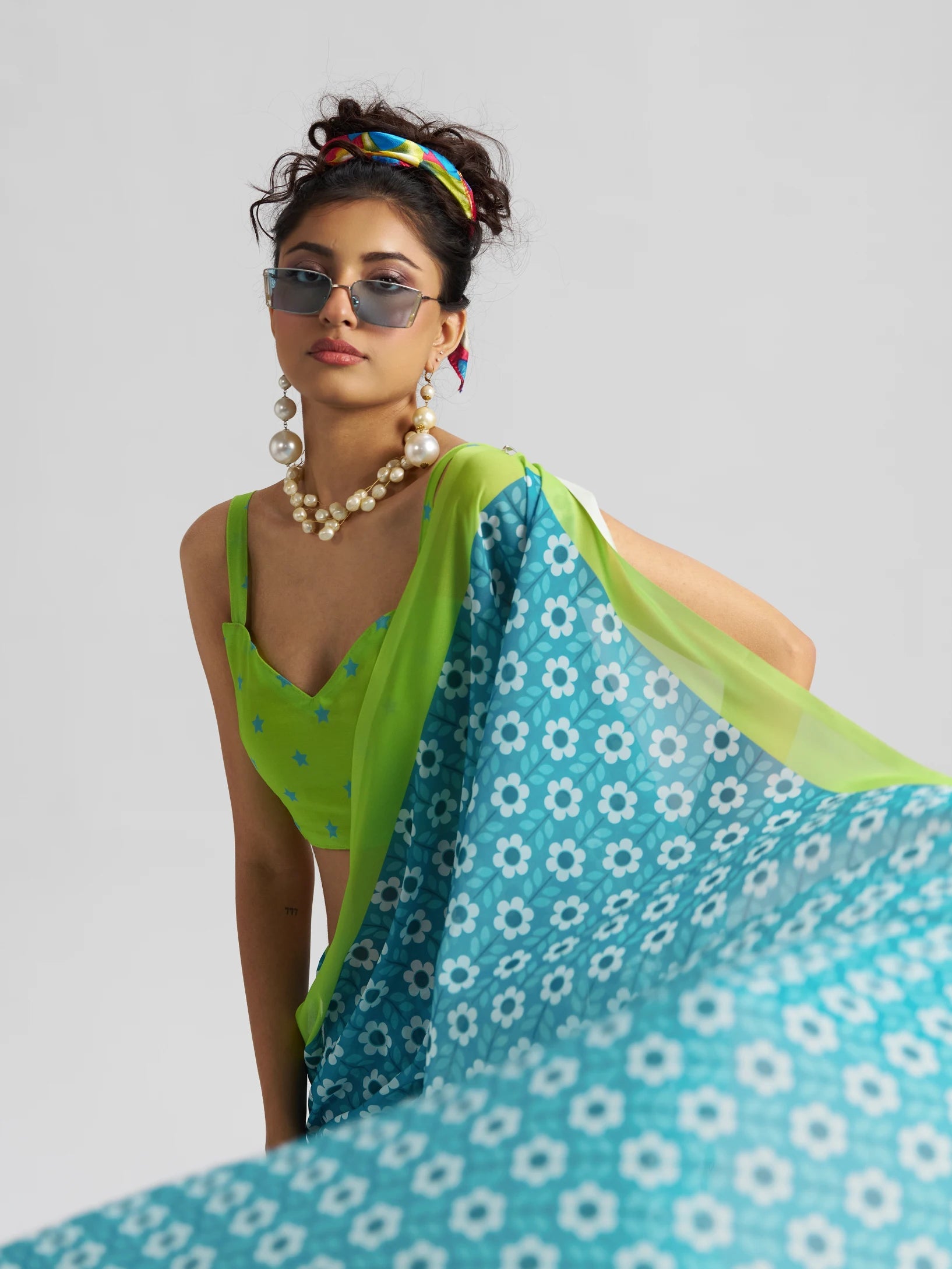 RETRO STYLE DIGITAL PRINTED FIROZI BLUE GEORGETTE SAREE
