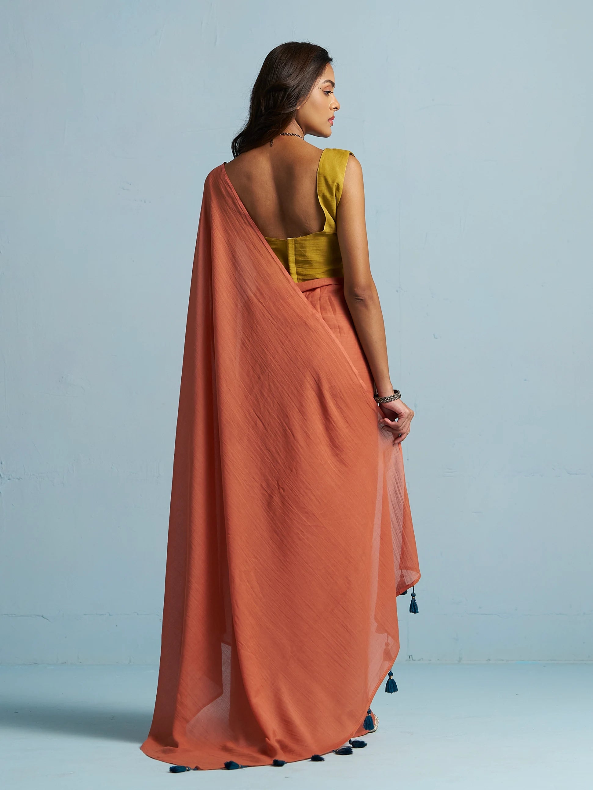 RUST ORANGE MULMUL COTTON LIVA SOLID SAREE