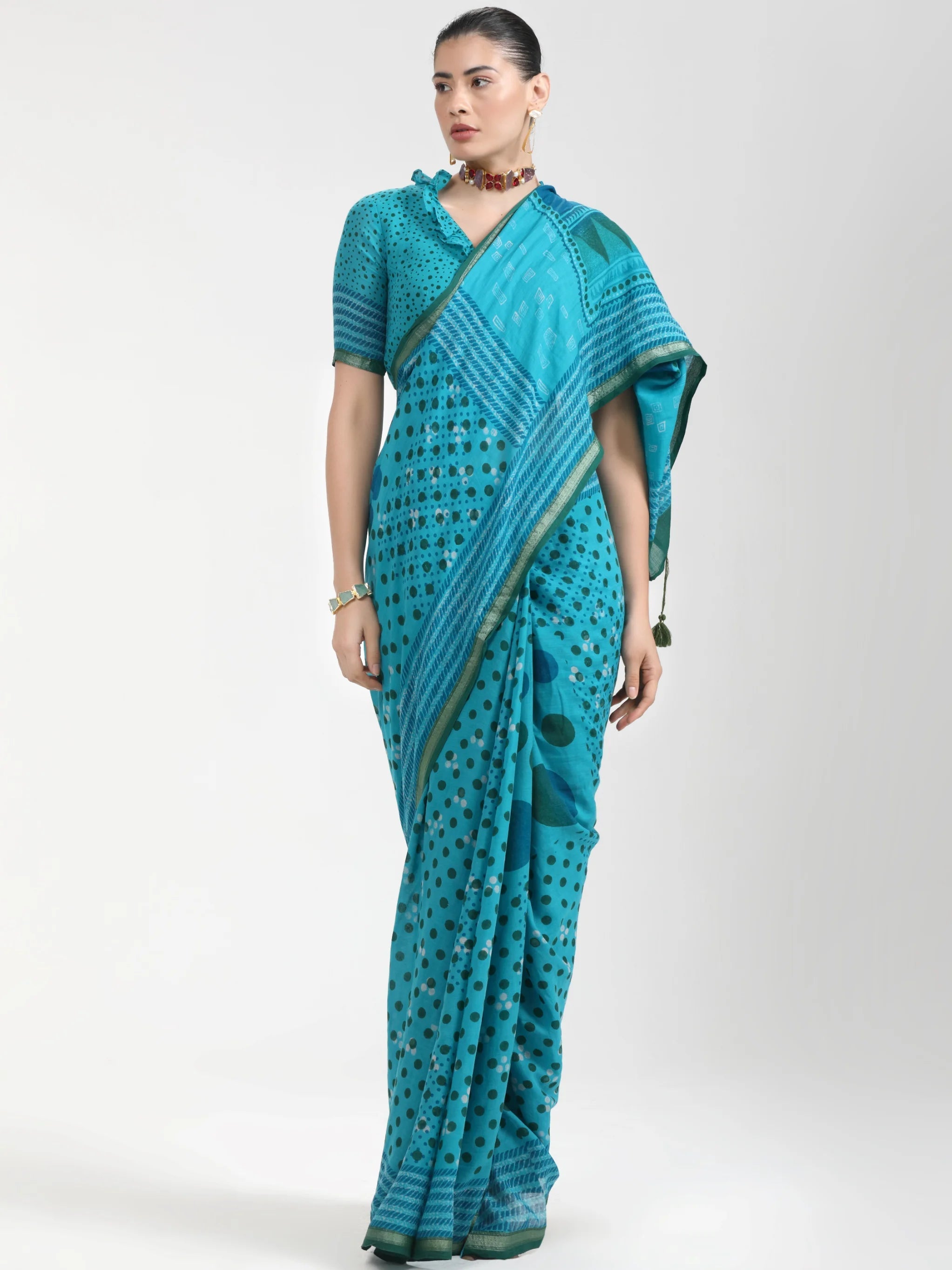 TURQUOISE BLUE VISCOSE MUL LIVA BLOCK PRINTED SAREE