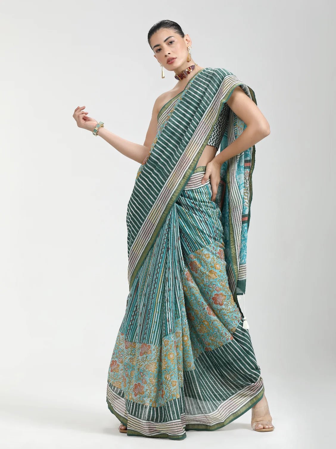 TURQUOISE MULMUL COTTON LIVA BLOCK PRINTED SAREE